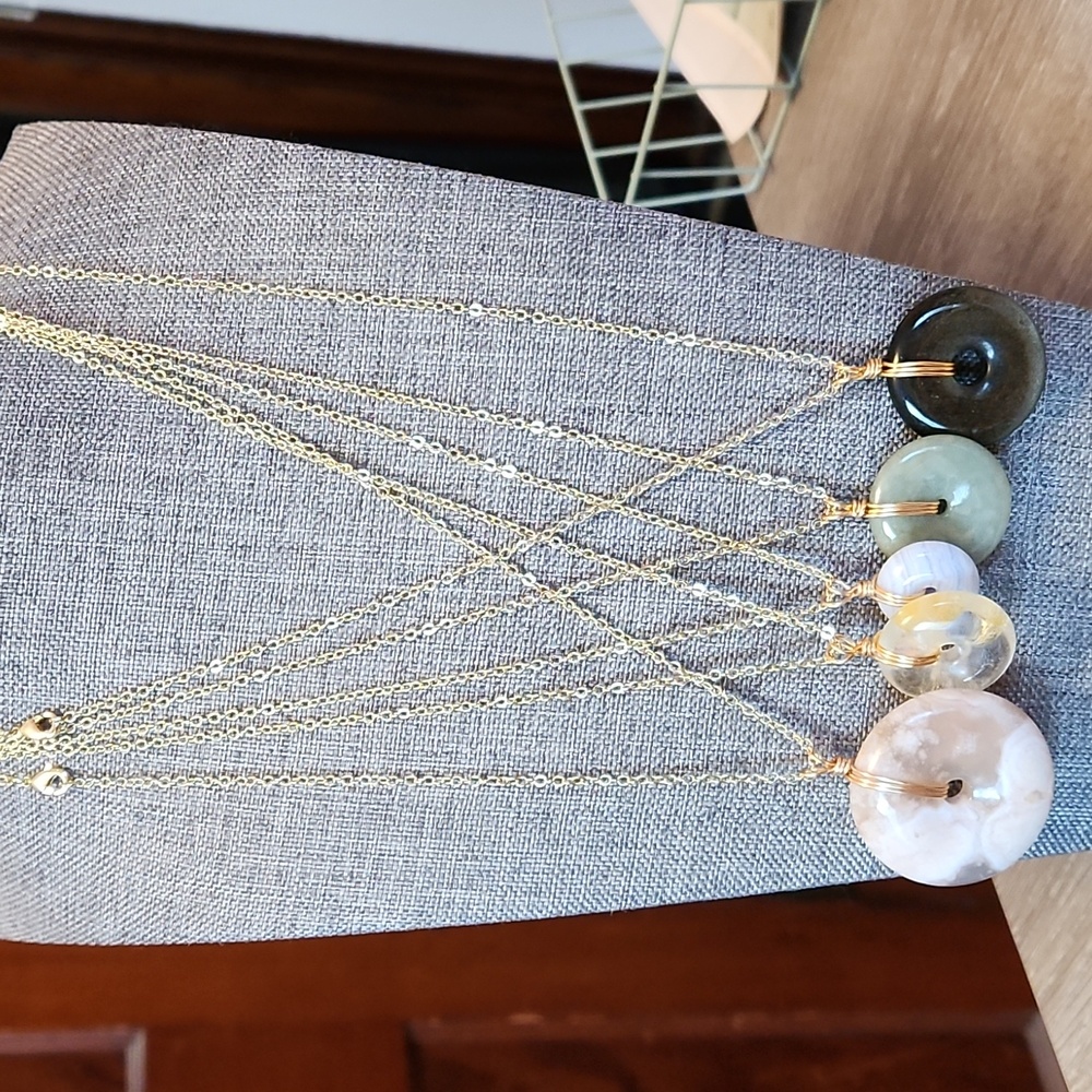 18 inch crystal donut necklaces on gold tone chain. Price is per necklace